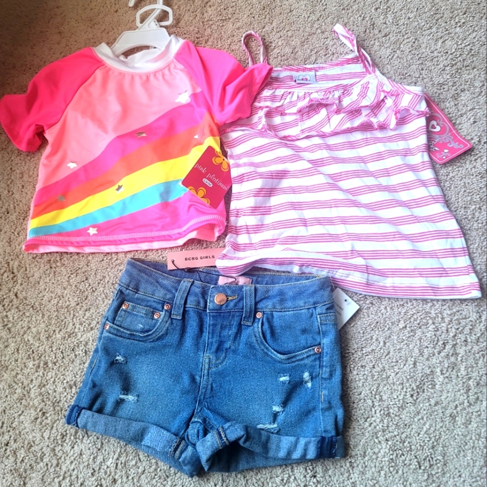 Girls 2 pc swim wear. Jean distressed shorts. T strap ruffle strip shirt. NWT
